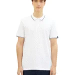 Men All-over Printed Polo Basic Fit White. Ανδρικό μπλουζάκι πικέ με γιακά και κοντό μανίκι. Κλασική γραμμή. Ελαφρύ και μαλακό ύφασμα. Λευκή βάση με μπλε και γαλάζια microprints. Σύνθεση 100% cotton . Collection : Spring / Summer 2024