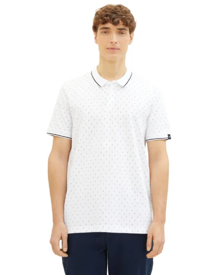 Men All-over Printed Polo Basic Fit White. Ανδρικό μπλουζάκι πικέ με γιακά και κοντό μανίκι. Κλασική γραμμή. Ελαφρύ και μαλακό ύφασμα. Λευκή βάση με μπλε και γαλάζια microprints. Σύνθεση 100% cotton . Collection : Spring / Summer 2024